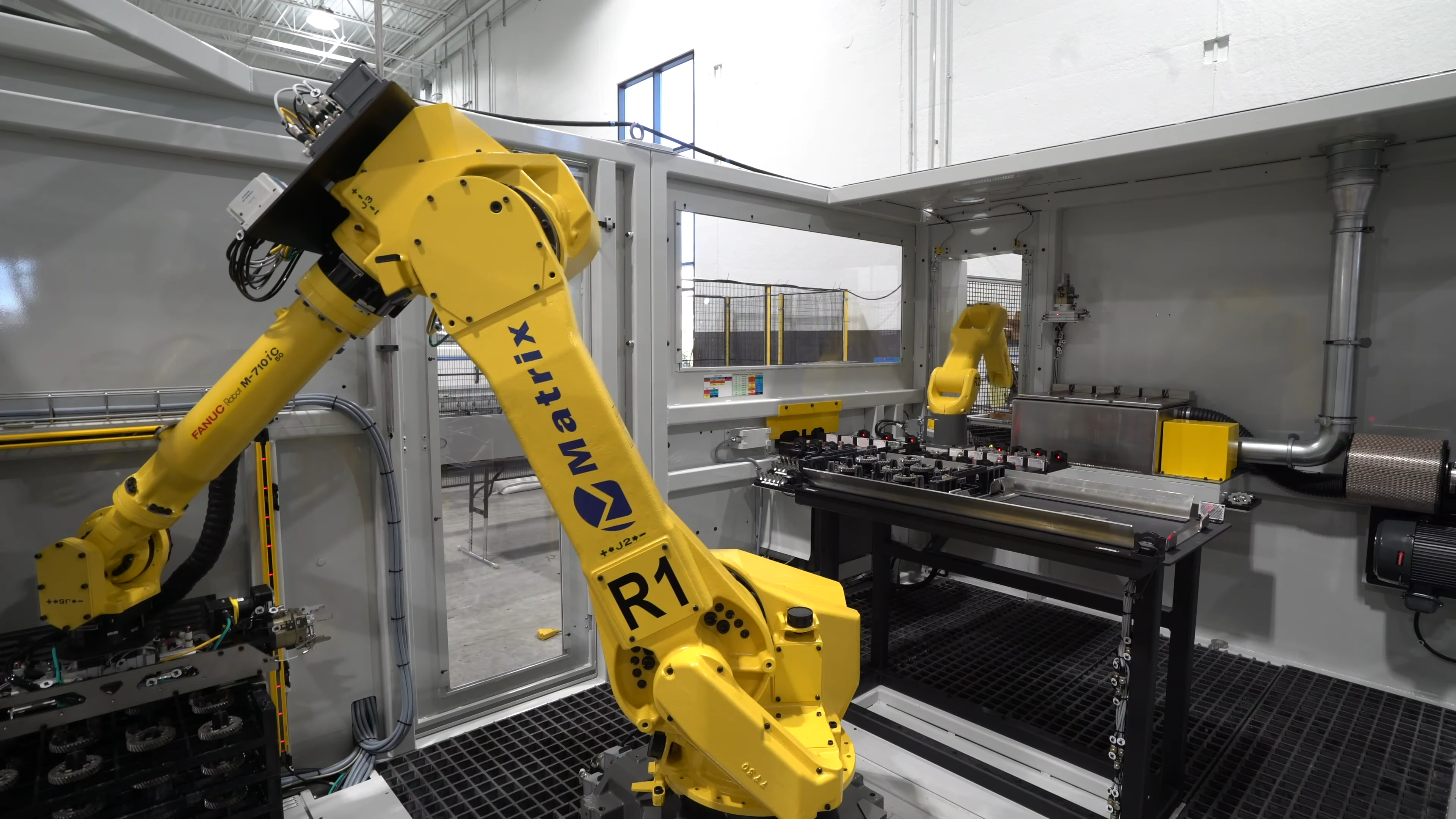 advanced loader robot in custom robotic cell from Matrix Design