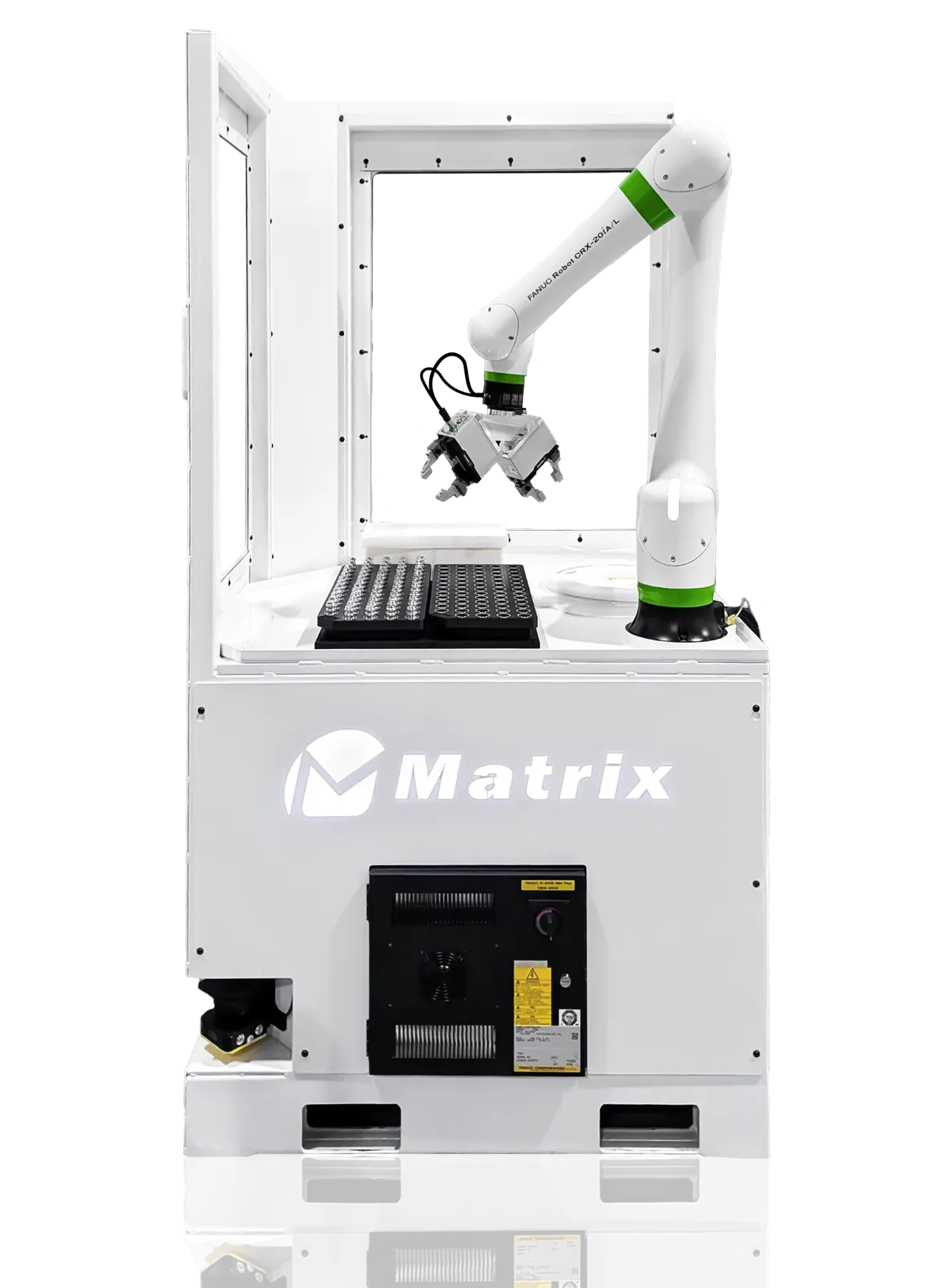 Industrial robotic arm inside a white enclosure with a worktable, Matrix branding visible, performing a pick-and-place task